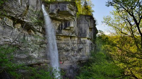 Hiking to a waterfall on the Indian Ladder Trail in John Boyd Thacher State Park