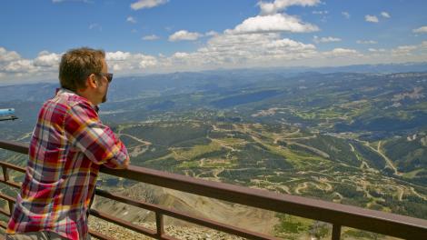 Standing at an overlook with sweeping views of Yellowstone Country, Montana