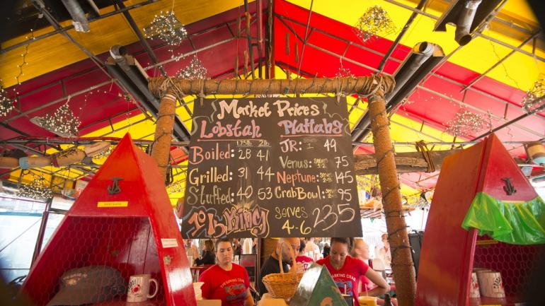Most of the eateries along the coast have a fun, funky vibe like this one. Don't be alarmed when the food comes out in baskets and the beer in plastic cups!