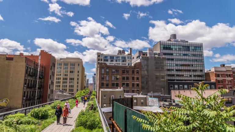 The High Line occupies what was once an elevated train track. The park weaves its way through the buildings of west Manhattan’s Chelsea neighborhood.