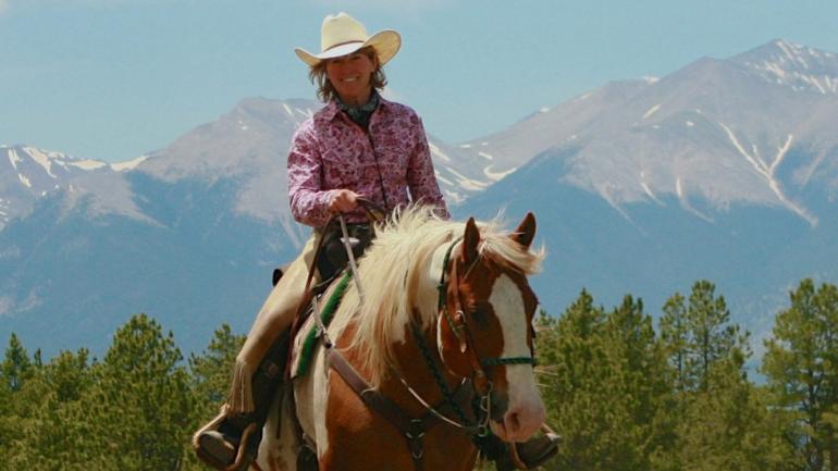 Riding against a backdrop of stunning Colorado mountains