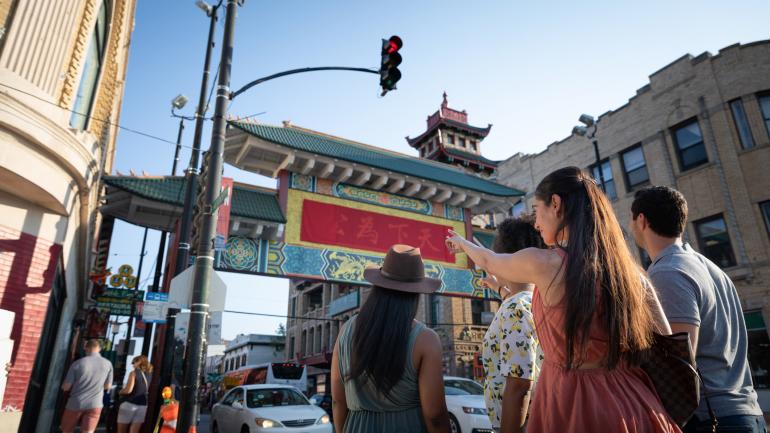 Visitors at the entrance of Chicago’s Chinatown neighborhood