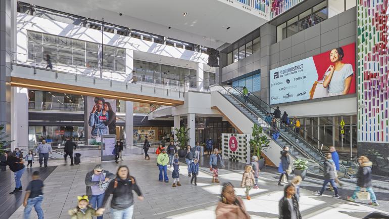 Colorful murals decorate the interior of Fashion District Philadelphia in Philadelphia, Pennsylvania