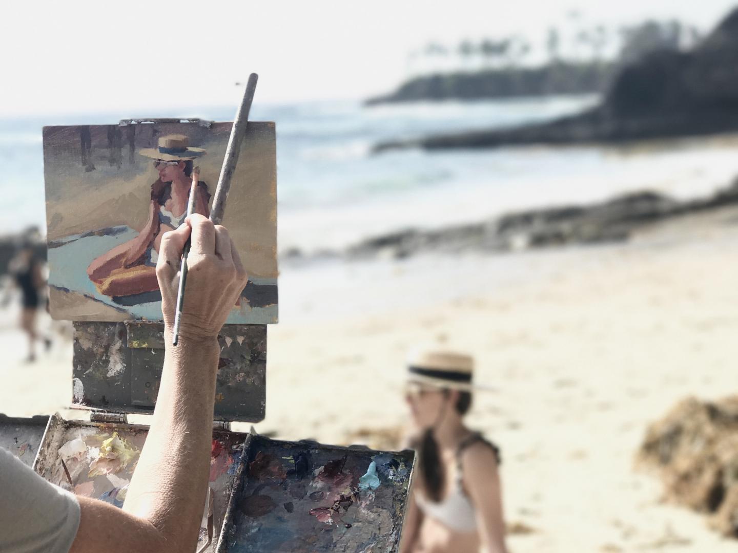 在拉古纳海滩户外写生邀请赛上描摹迷人的海滩风景