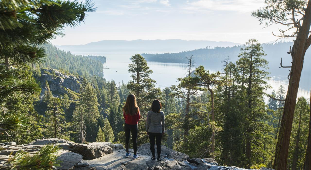 Women overlooking Lake Tahoe from Emerald Bay State Park in California