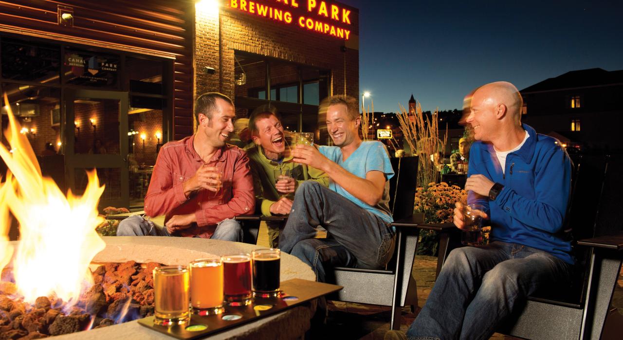 Enjoying the outdoor firepit and a beer flight at Canal Park Brewing Company