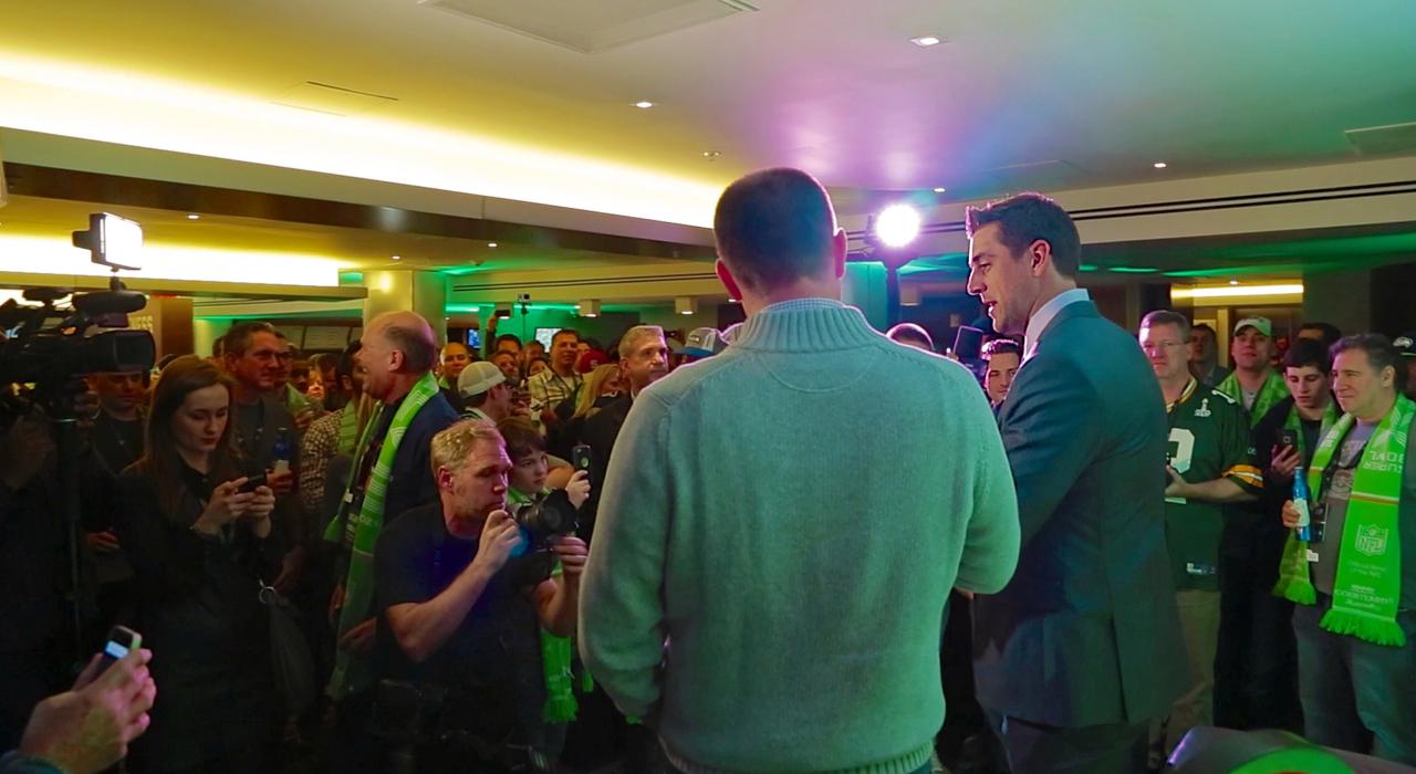 Observing a press conference to learn about game-week details