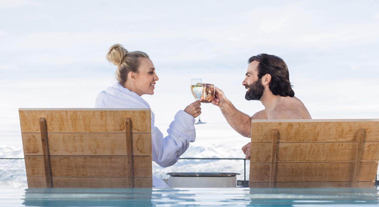 Relaxing poolside with a drink and incredible mountain views