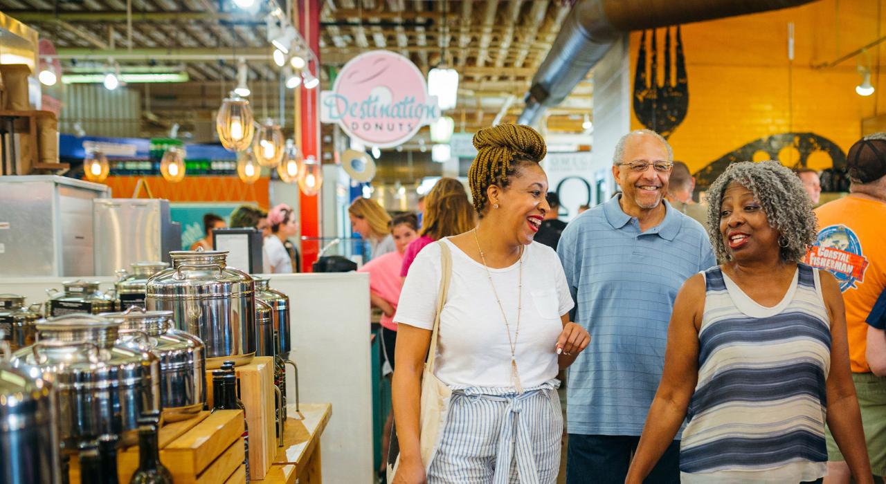 Family browsing the North Market public market