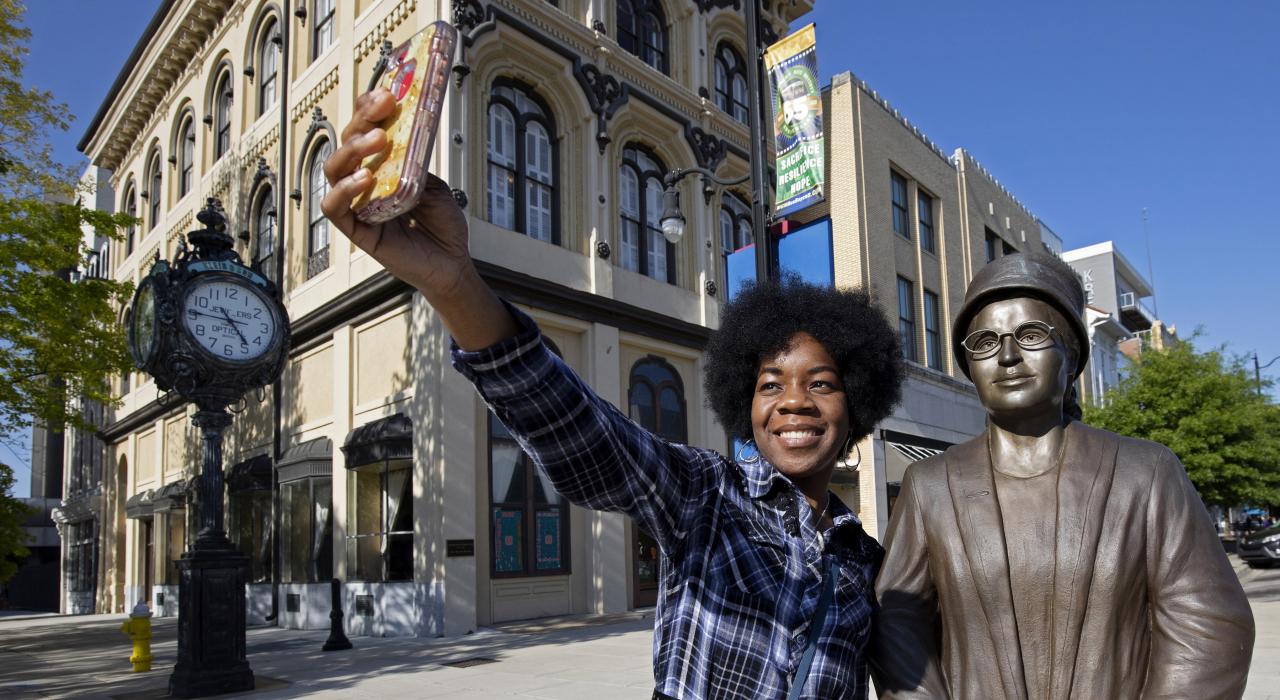 Taking a selfie with the Rosa Parks Statue in downtown Montgomery, Alabama