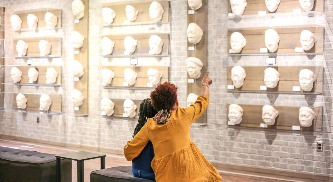 Viewing the “Cast of Blues” exhibit in Ewing Hall at Delta State University